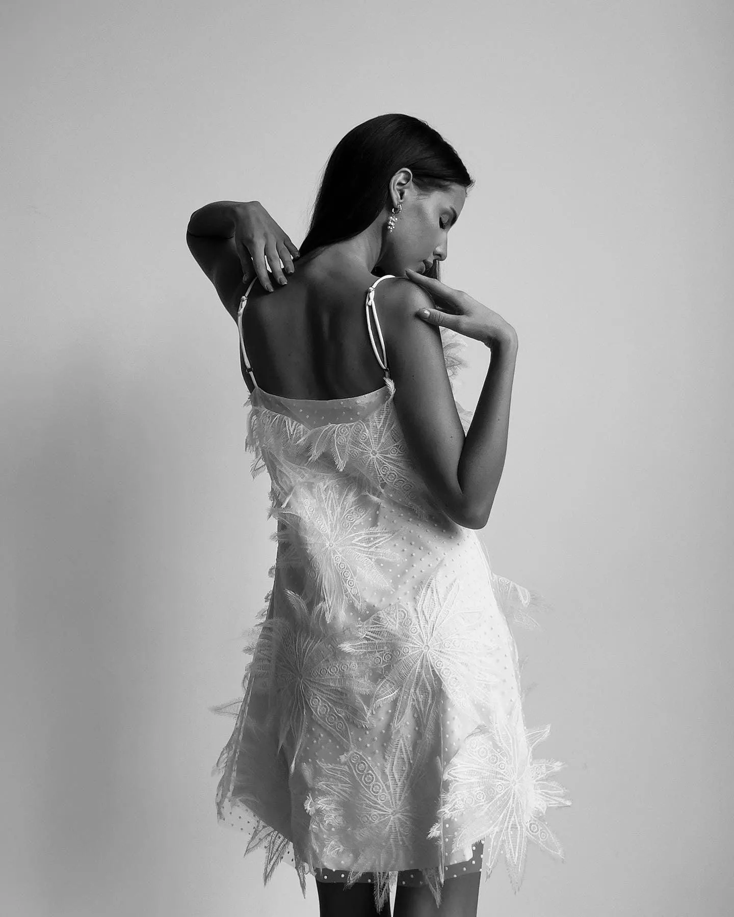 Feathered Elegance Mini Dress
