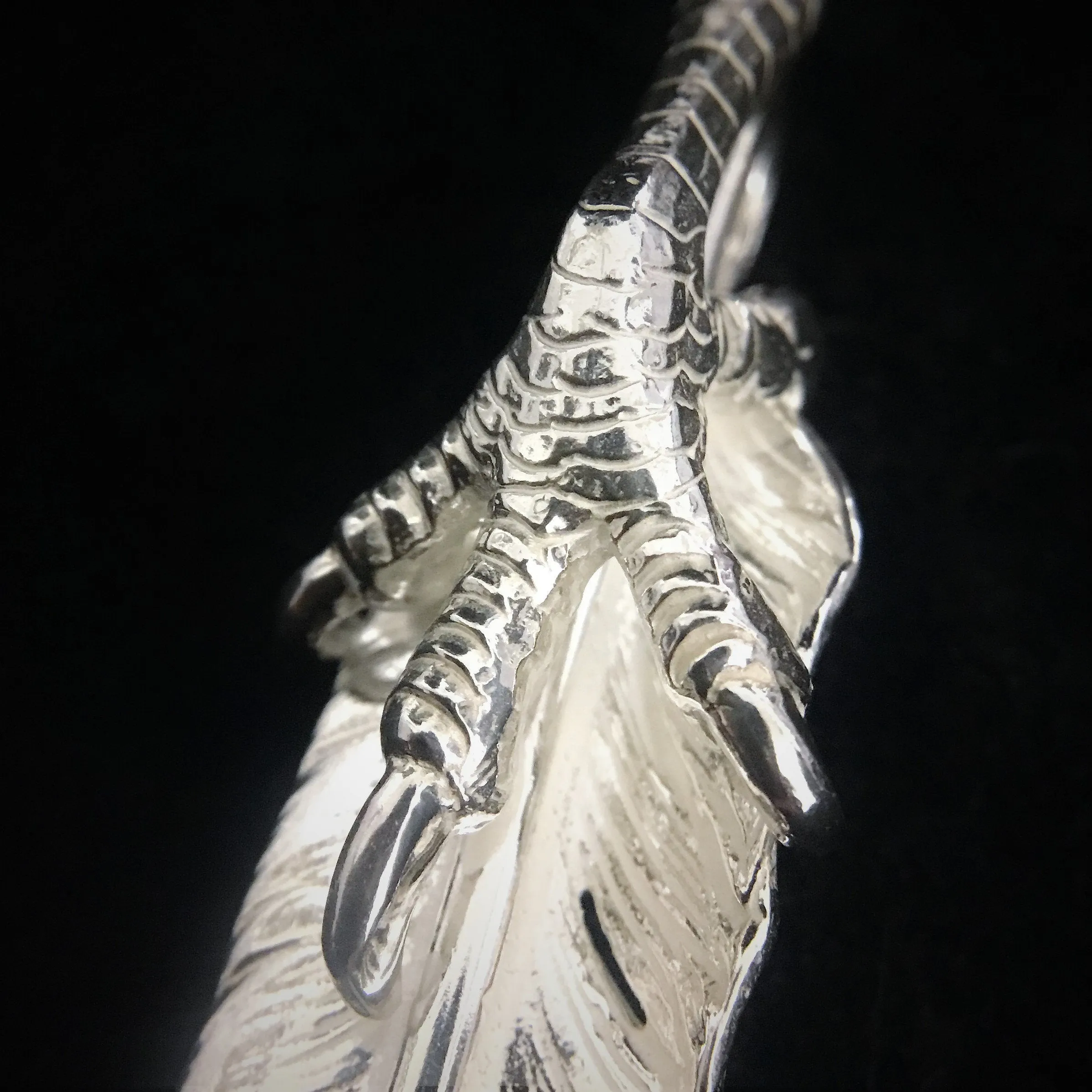Goros Feather With Silver Claw - Facing Left