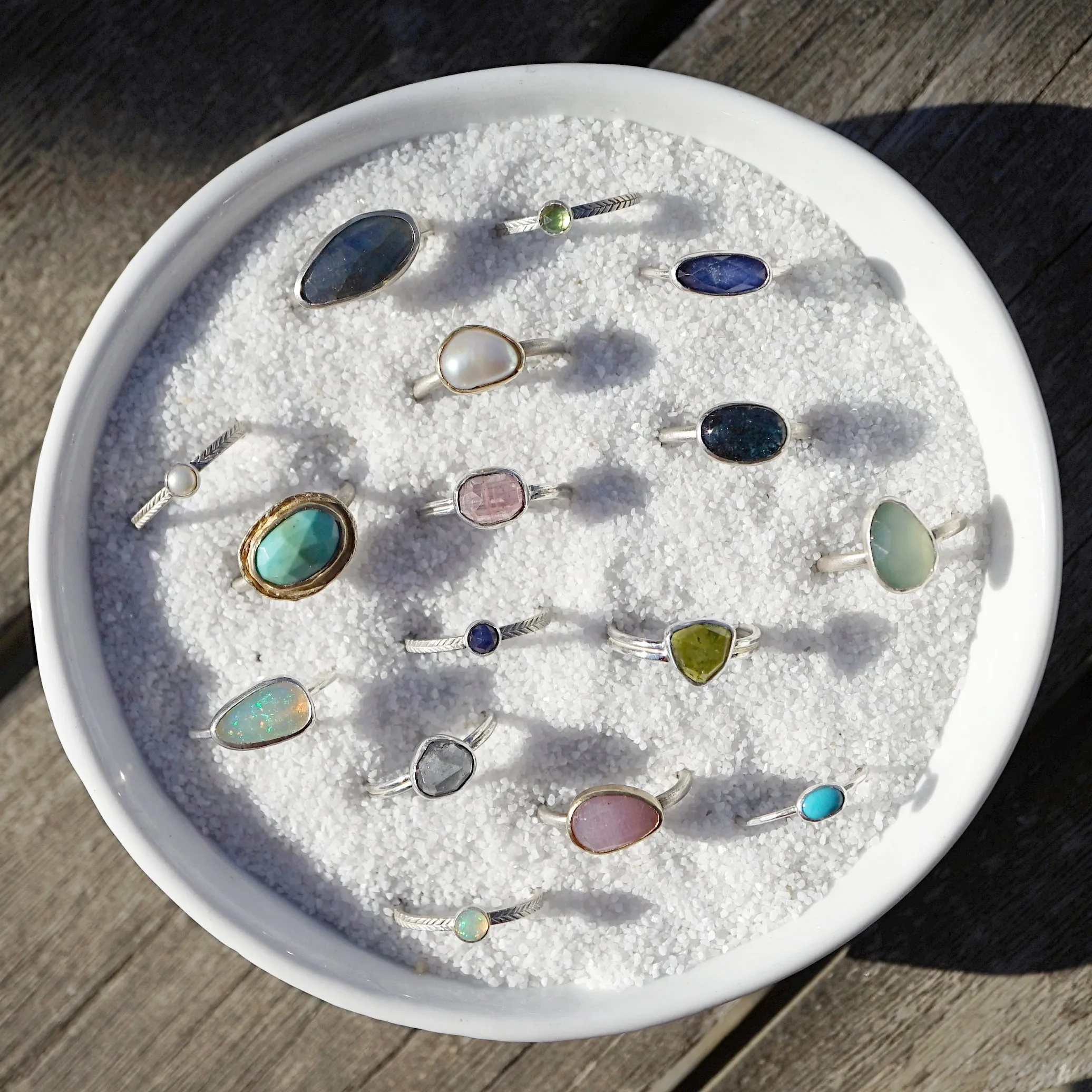 Opal ring with hand-carved feather textures